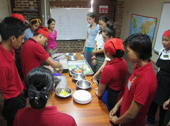 Cooking demonstration for the students from the USA by students from Sanon